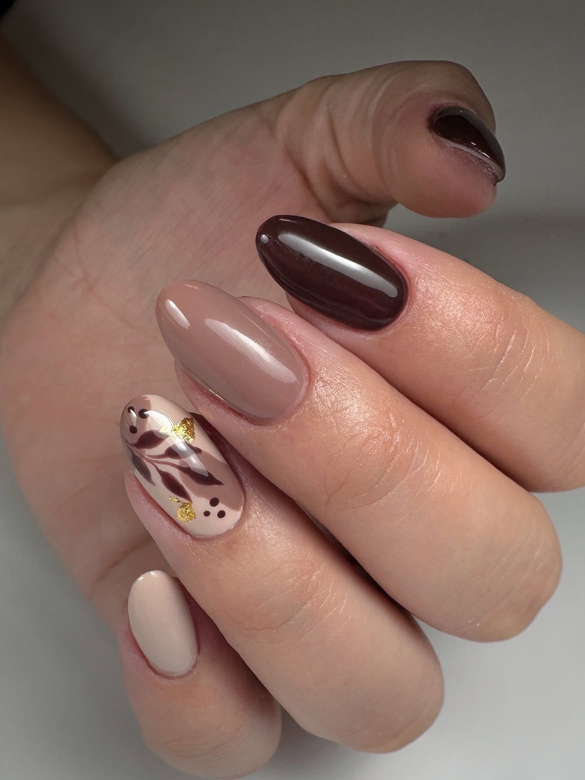 Chocolate Brown Oval Nails with Gold Leaf Art