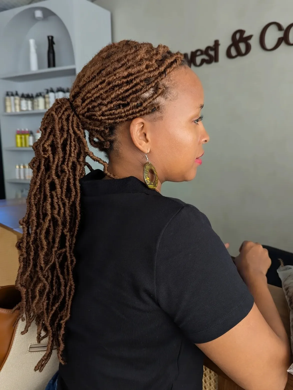 Chunky Locs Tied In A High Ponytail