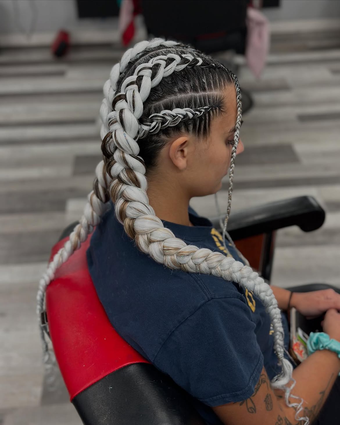 Chunky Platinum Braids With Dark Roots