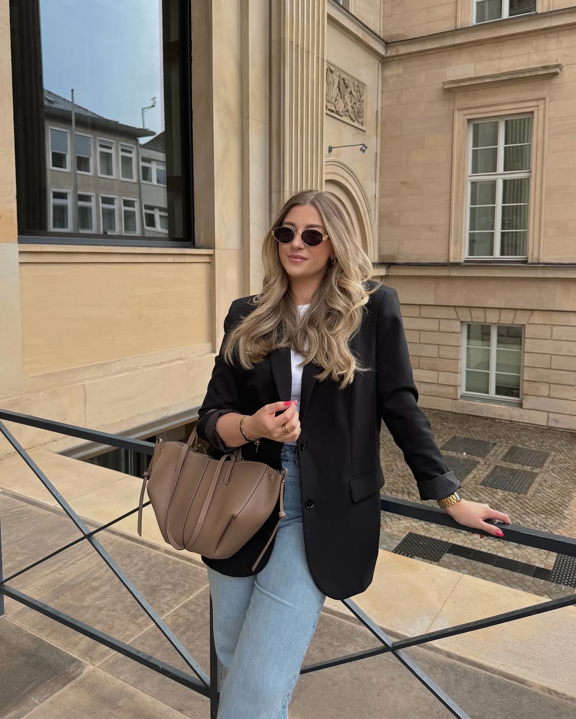 Classic Black Blazer With Light Wash Jeans Ensemble