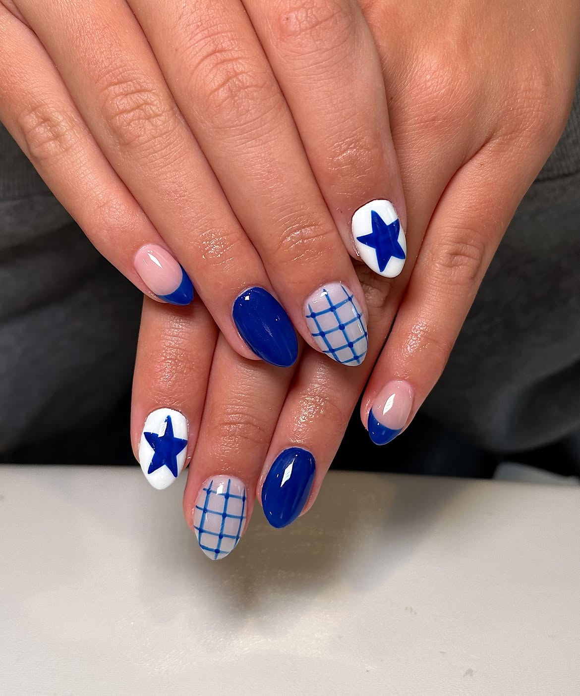 Classic Blue French Tip and Star Accent Nails