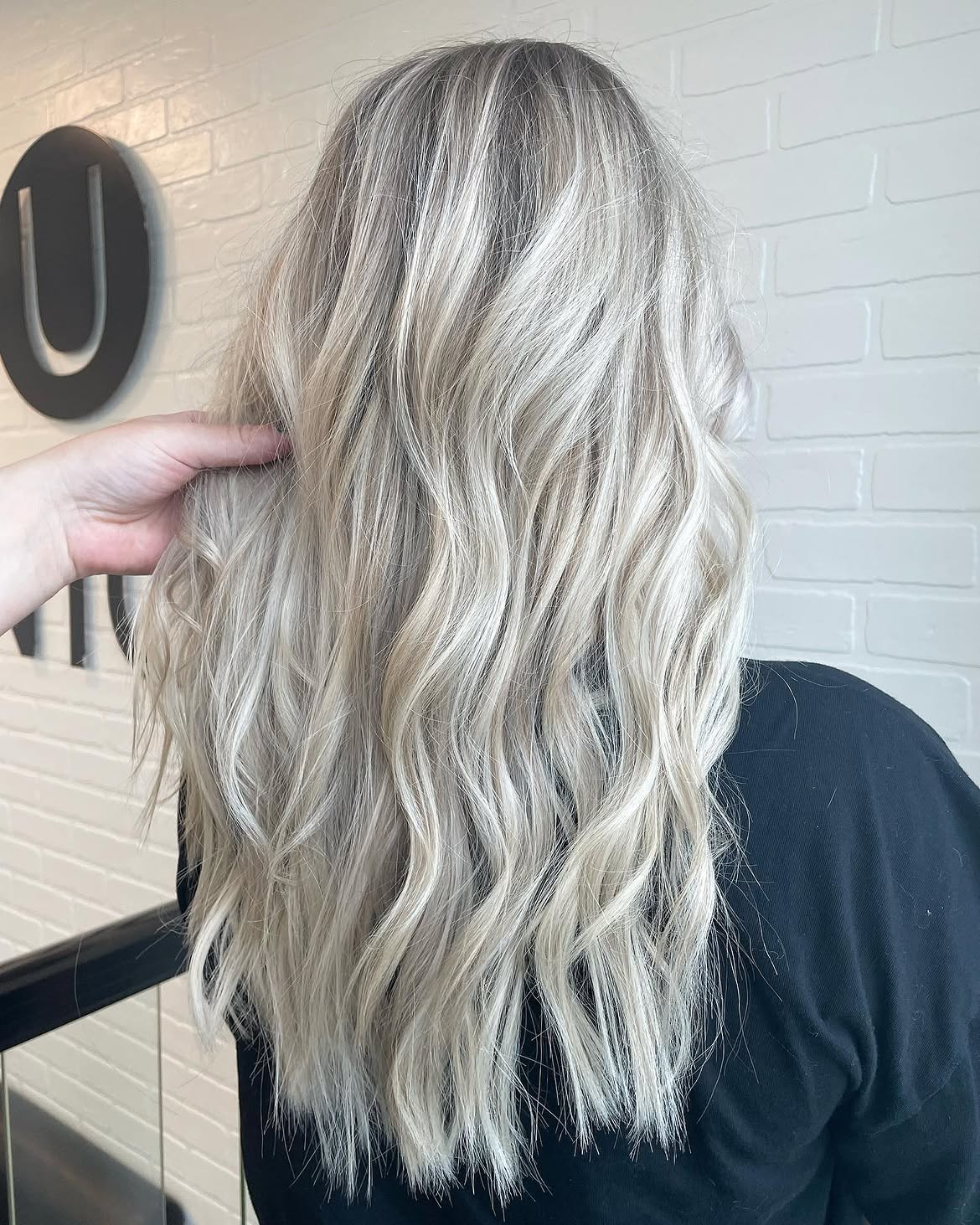 Cool Ash Blonde Waves With Subtle Dimension