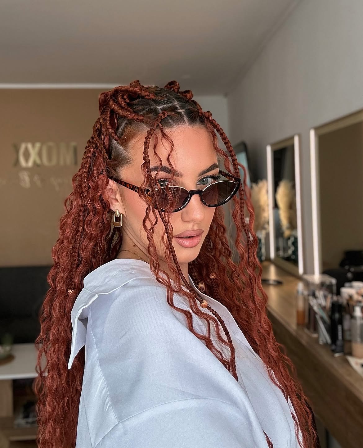 Copper Red Crochet Braids With Half-Up Top Knots