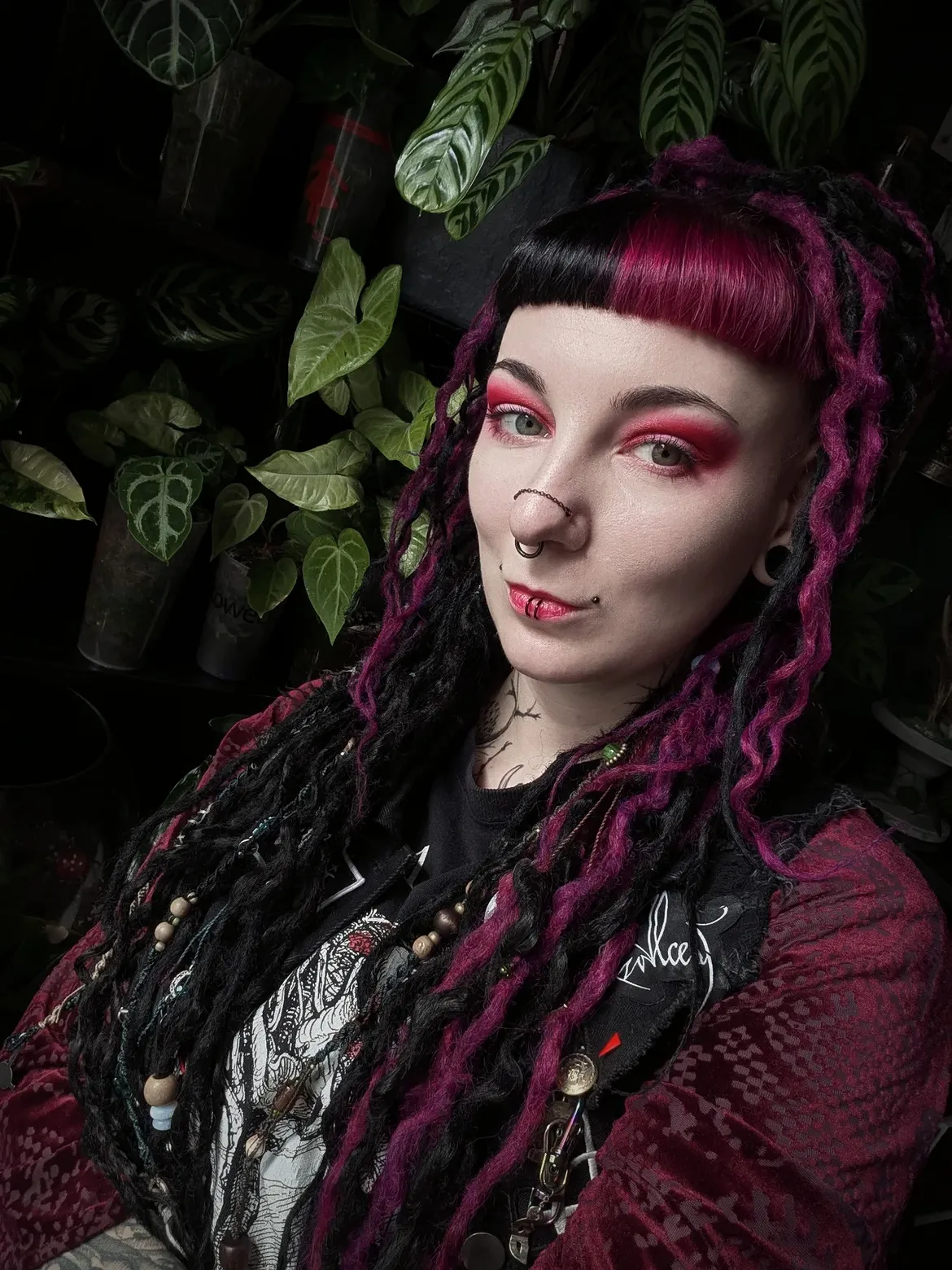 Crimson Bangs And Dark Dreads With Beads