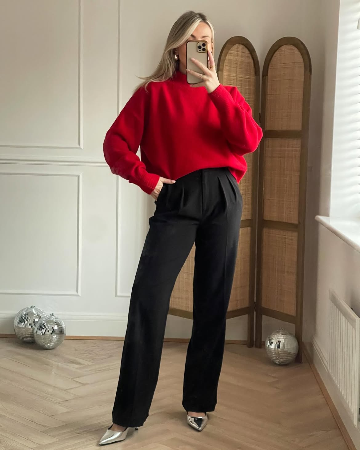 Crimson Knit Meets Sleek Black Trousers Party Look