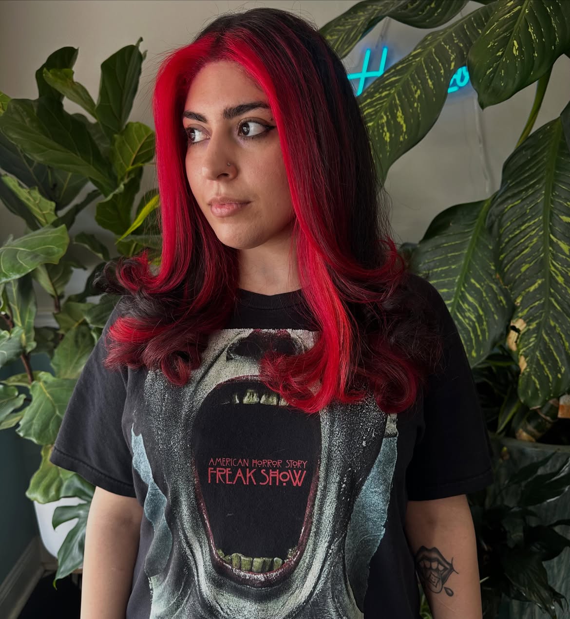 Crimson Streaked Black Hair With Face Framing Volume