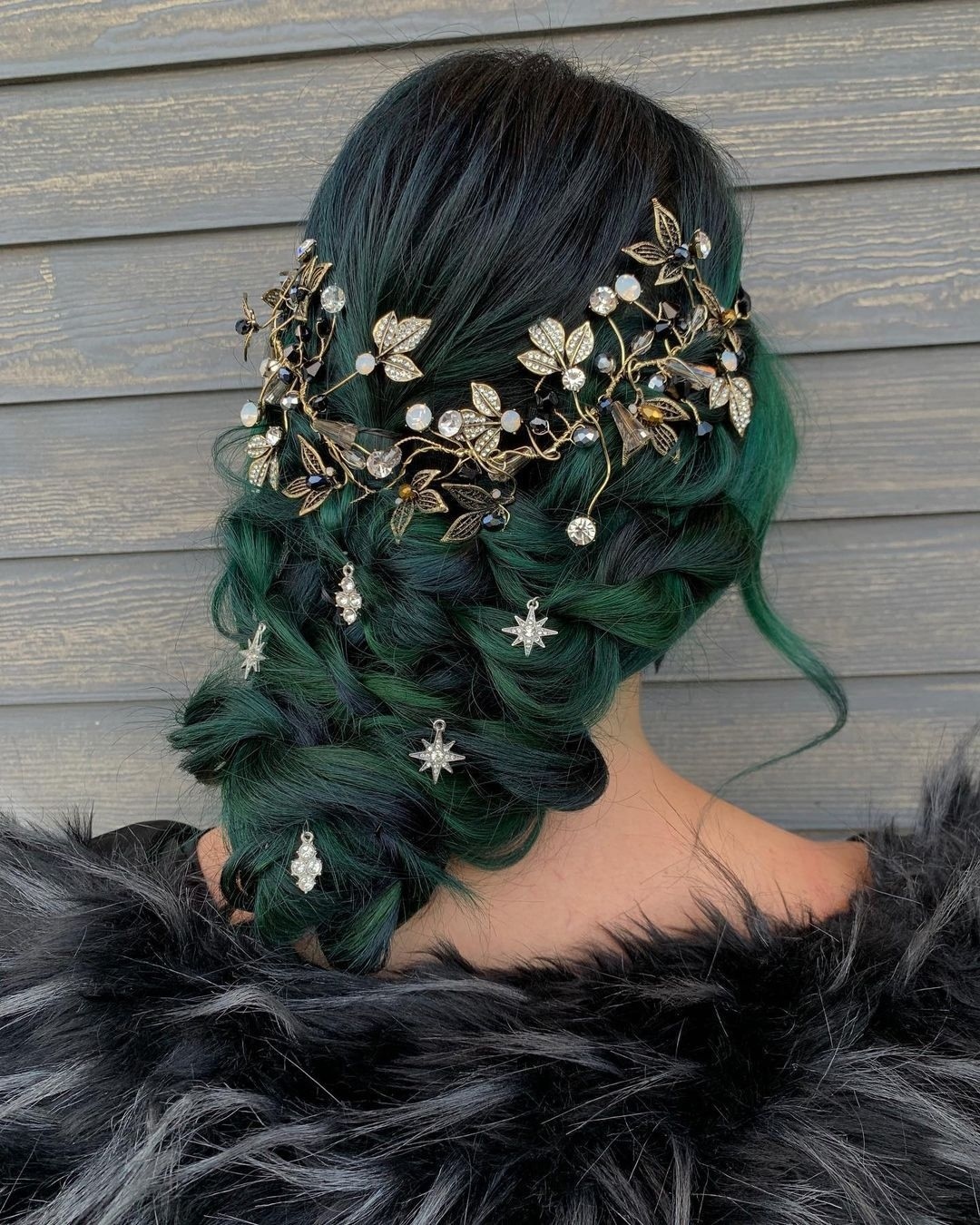 Dark Emerald Braided Updo With Celestial Charms