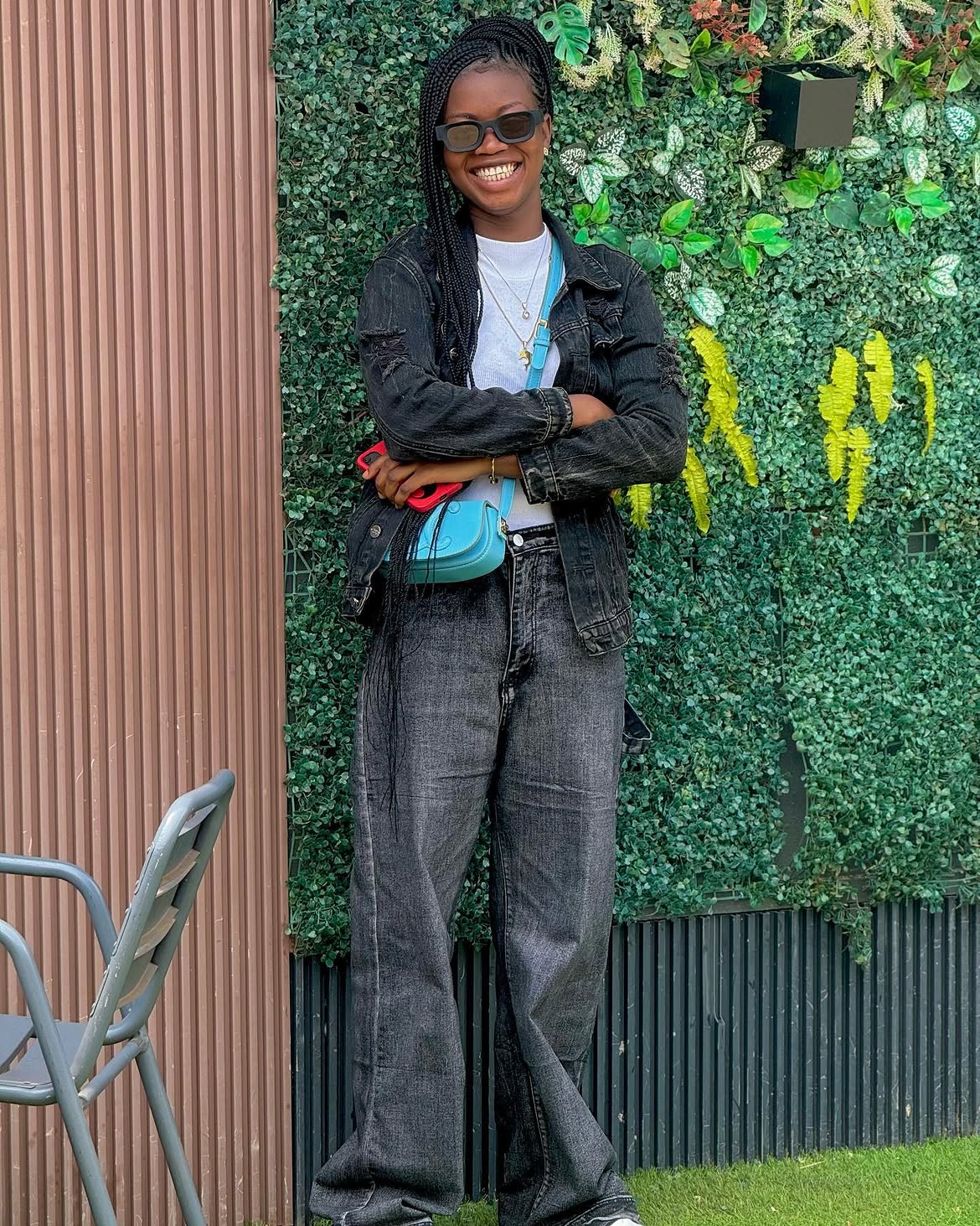 Dark Wash Denim On Denim With Bright Blue Bag