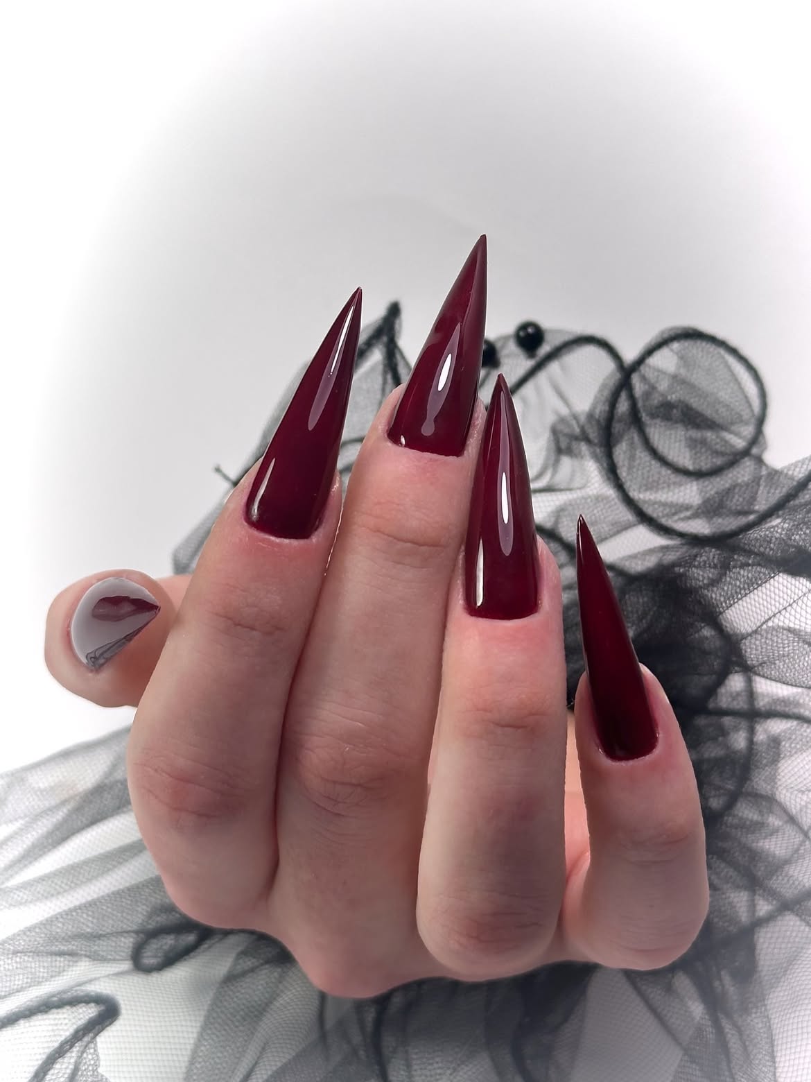 Deep Burgundy Stiletto Gel Nails