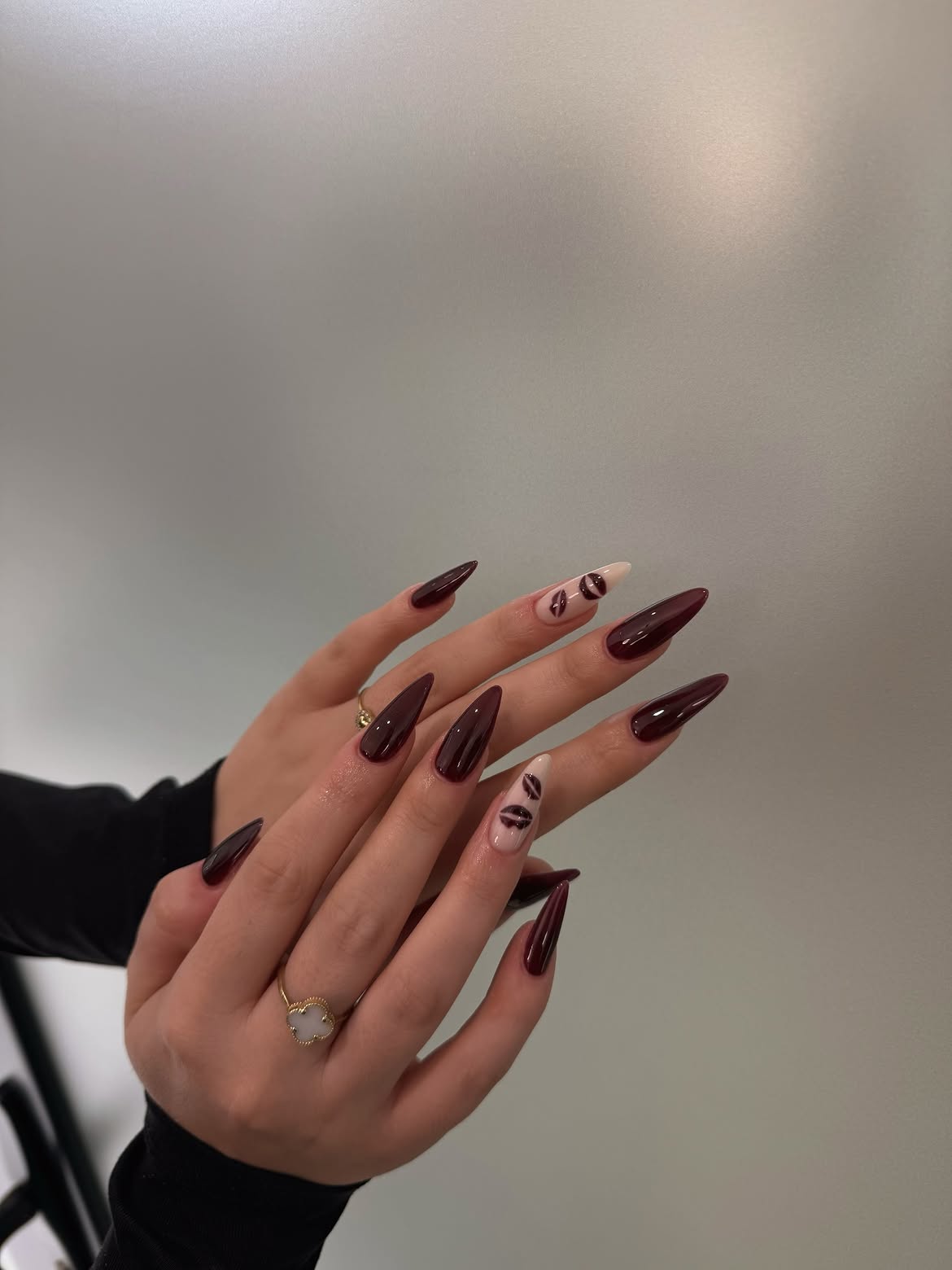 Deep Burgundy Stiletto Nails with Chic Lip Art