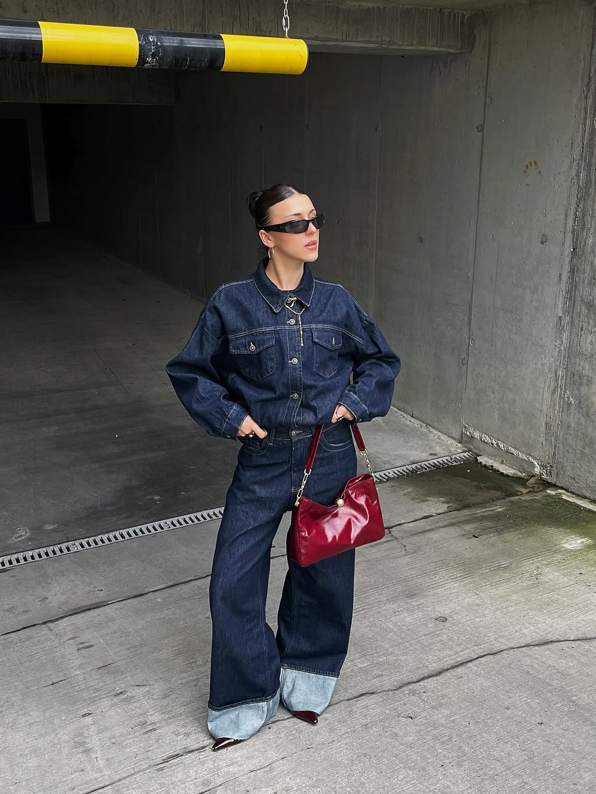 Deep Indigo Denim Two-Piece With Bold Cherry Red Bag