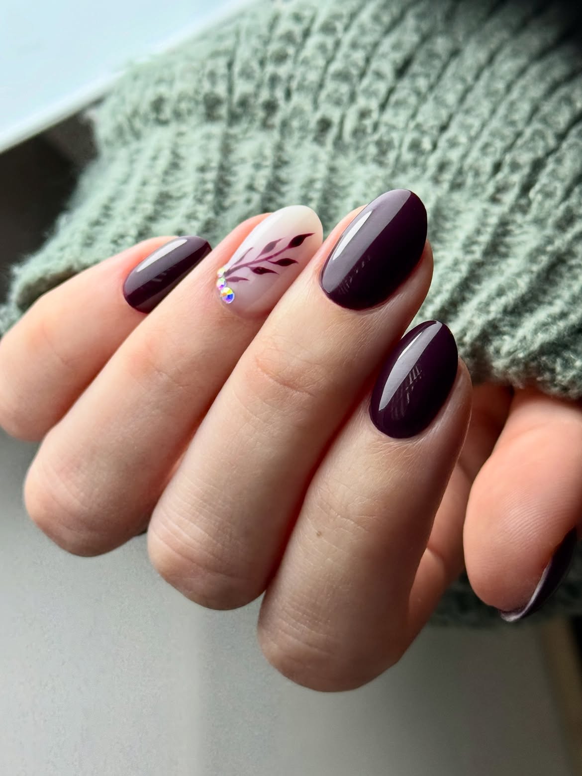 Deep Plum Oval Nails With Fall Leaf Art
