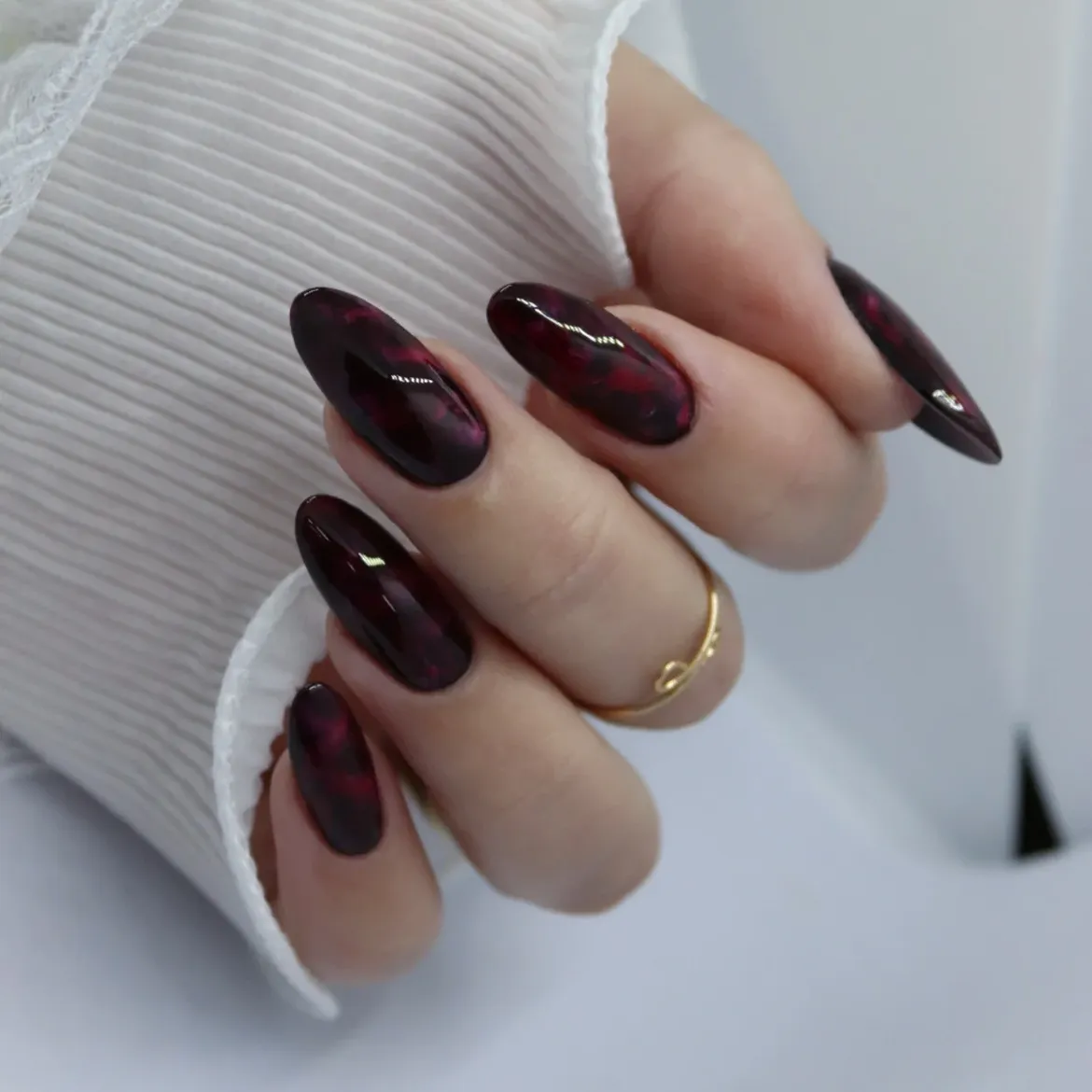 Deep Red Marble Glossy Almond Nails