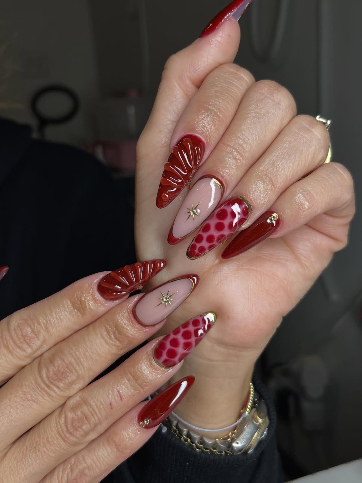 Deep Red Snake Print & Textured Almond Nails