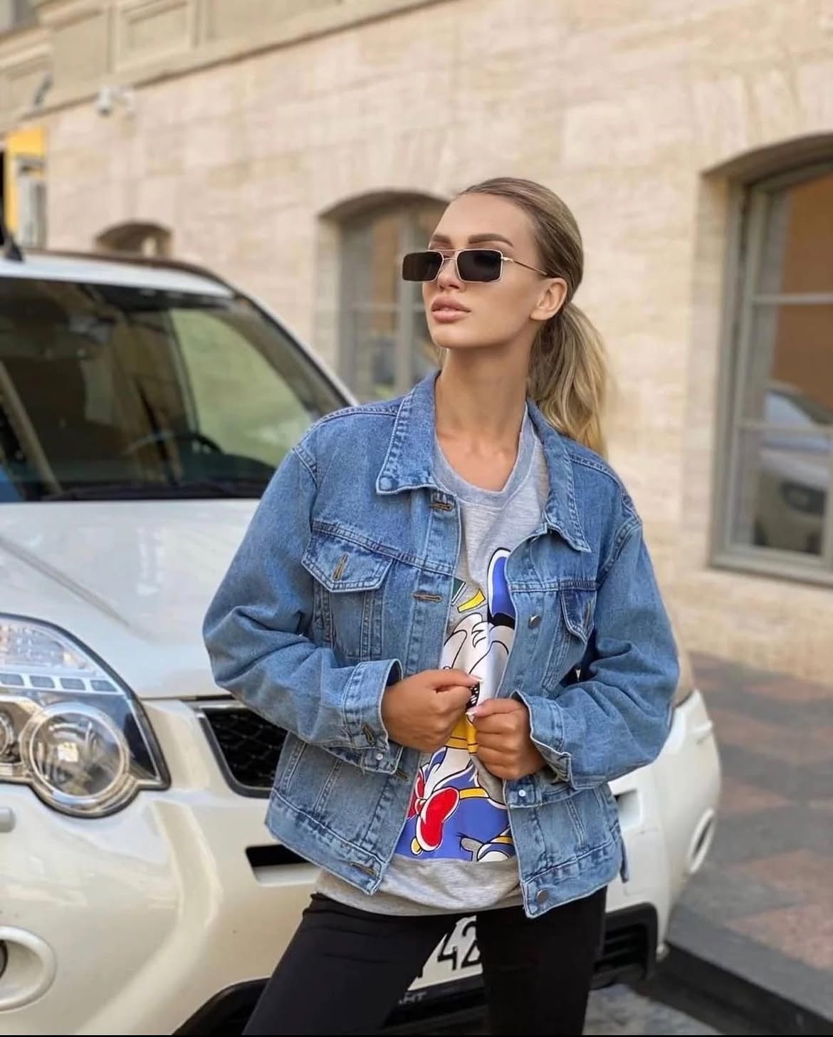 Denim Jacket With Graphic Tee And Black Leggings