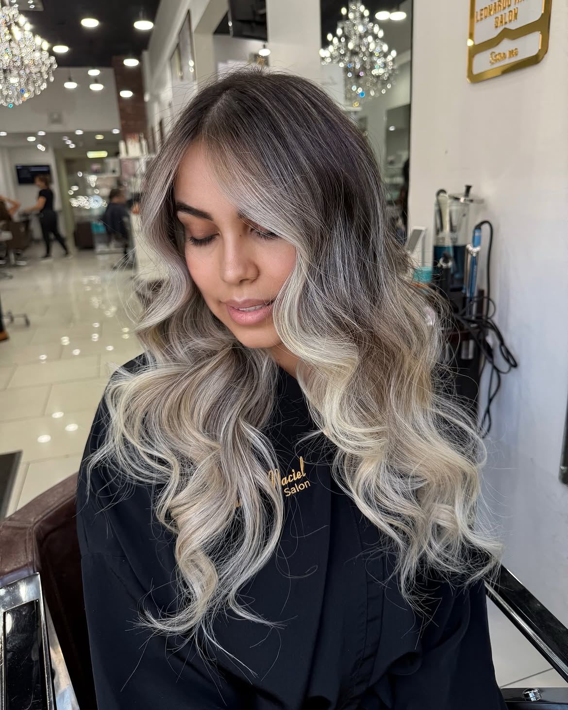 Dimensional Ash Blonde Waves With Face Framing