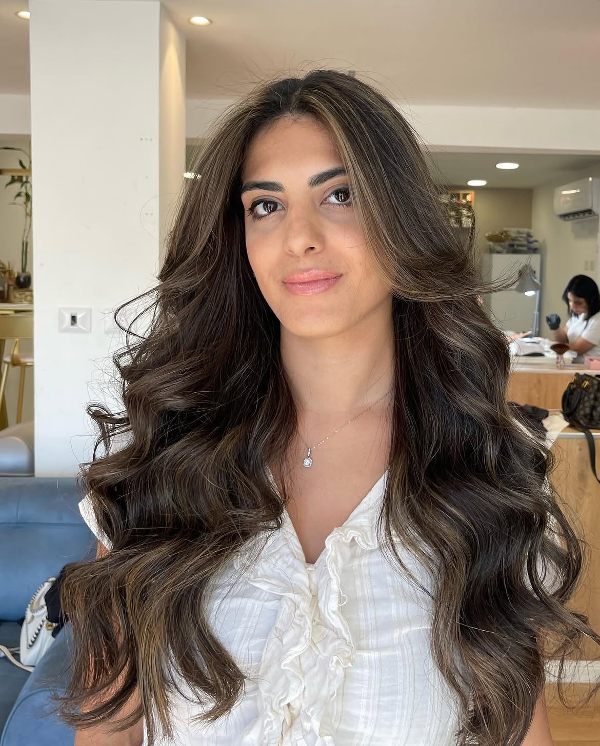Dimensional Brunette Waves With Caramel Highlights