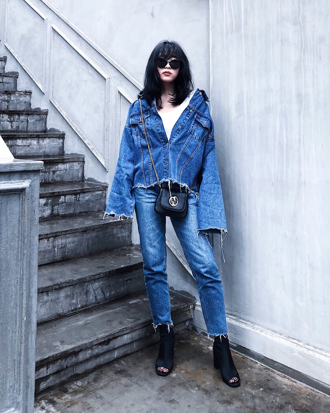 Distressed Denim Duo With Edgy Ankle Boots