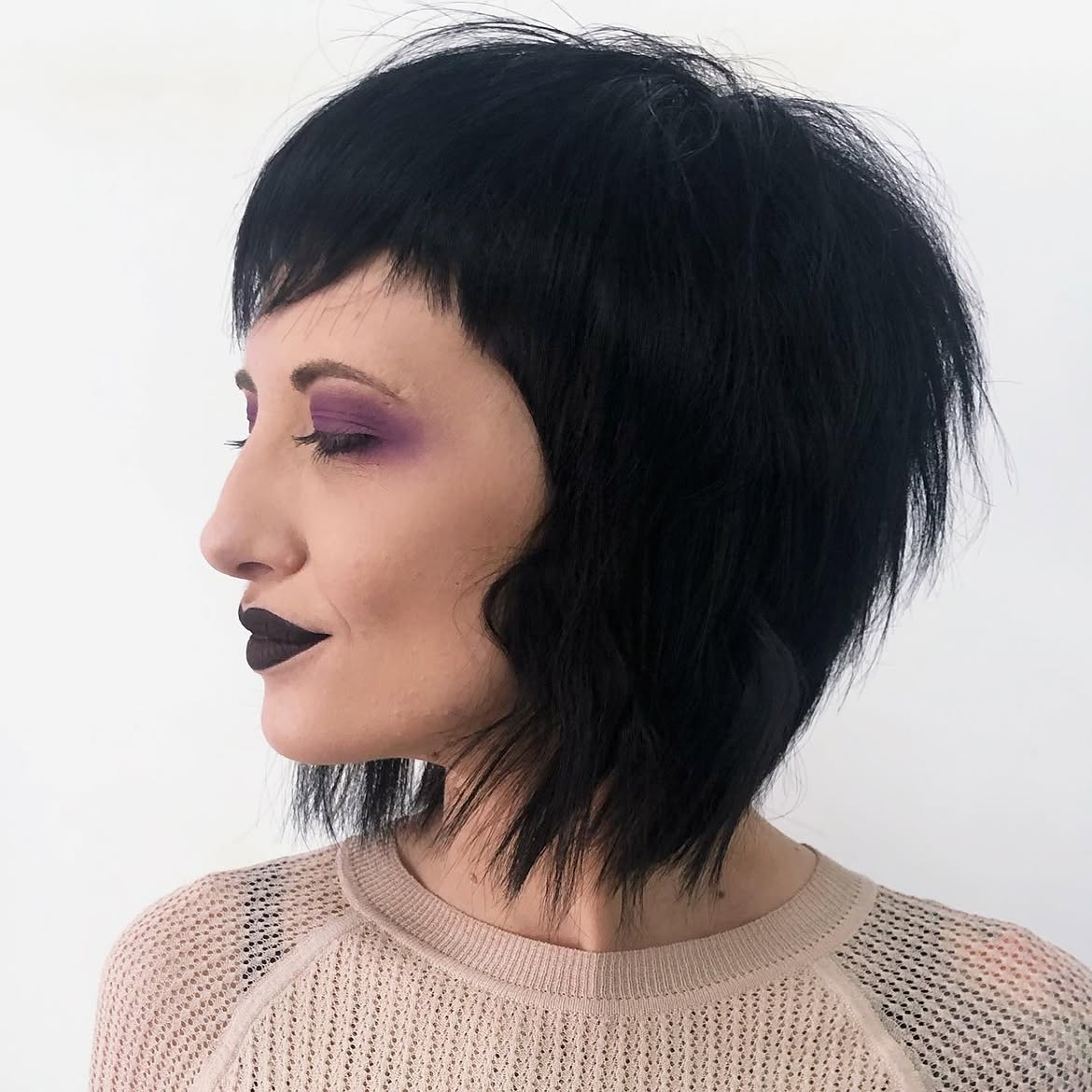 Edgy Black Shag With Wispy Micro Bangs