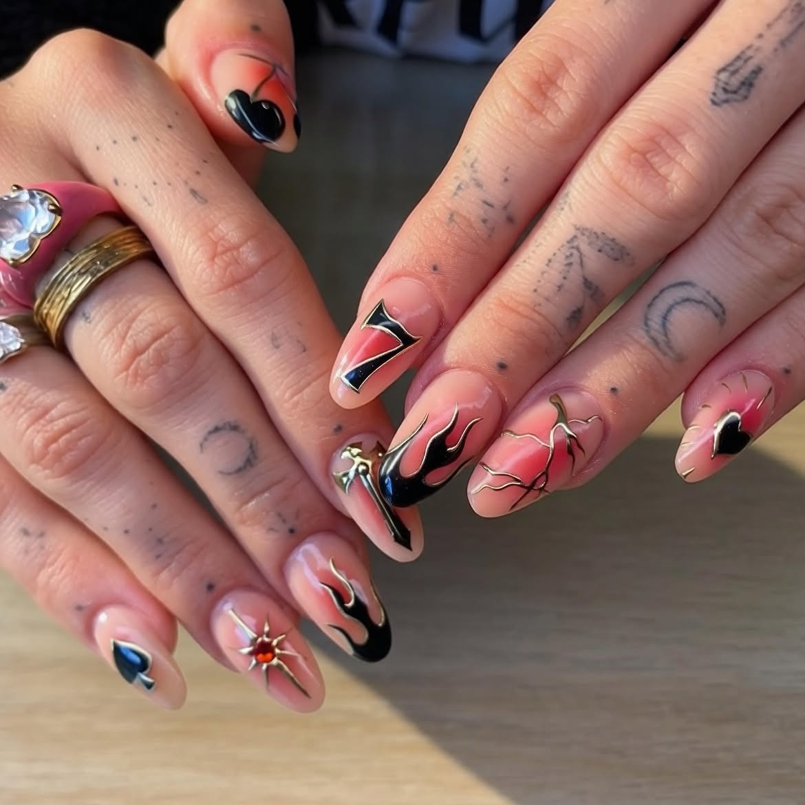 Edgy Flame Spade & Cherry Oval Nails