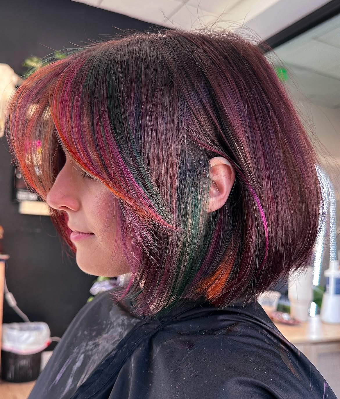 Edgy Multicolored Choppy Bob With Cherry Undertones