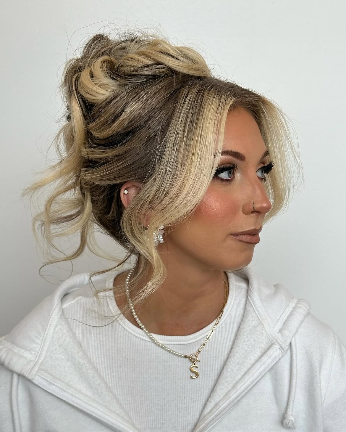 Effortless Chignon With Textured Face Framing Pieces