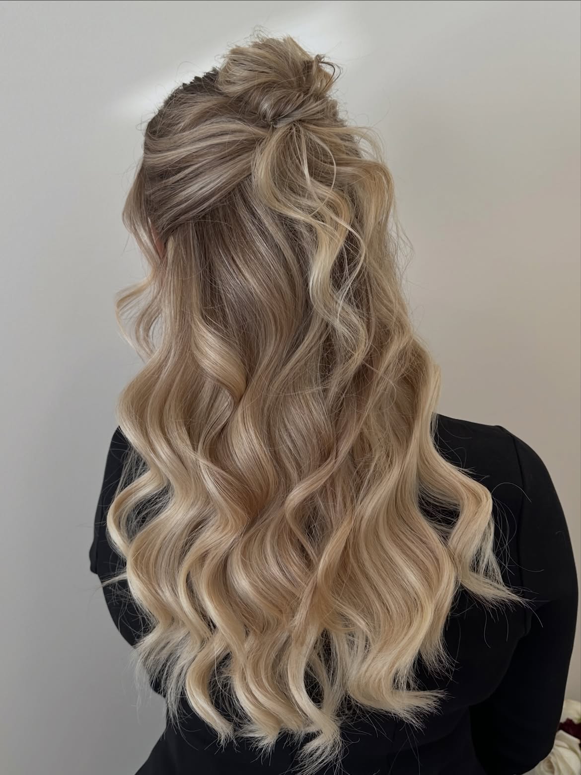 Effortless High Bun With Loose Waves
