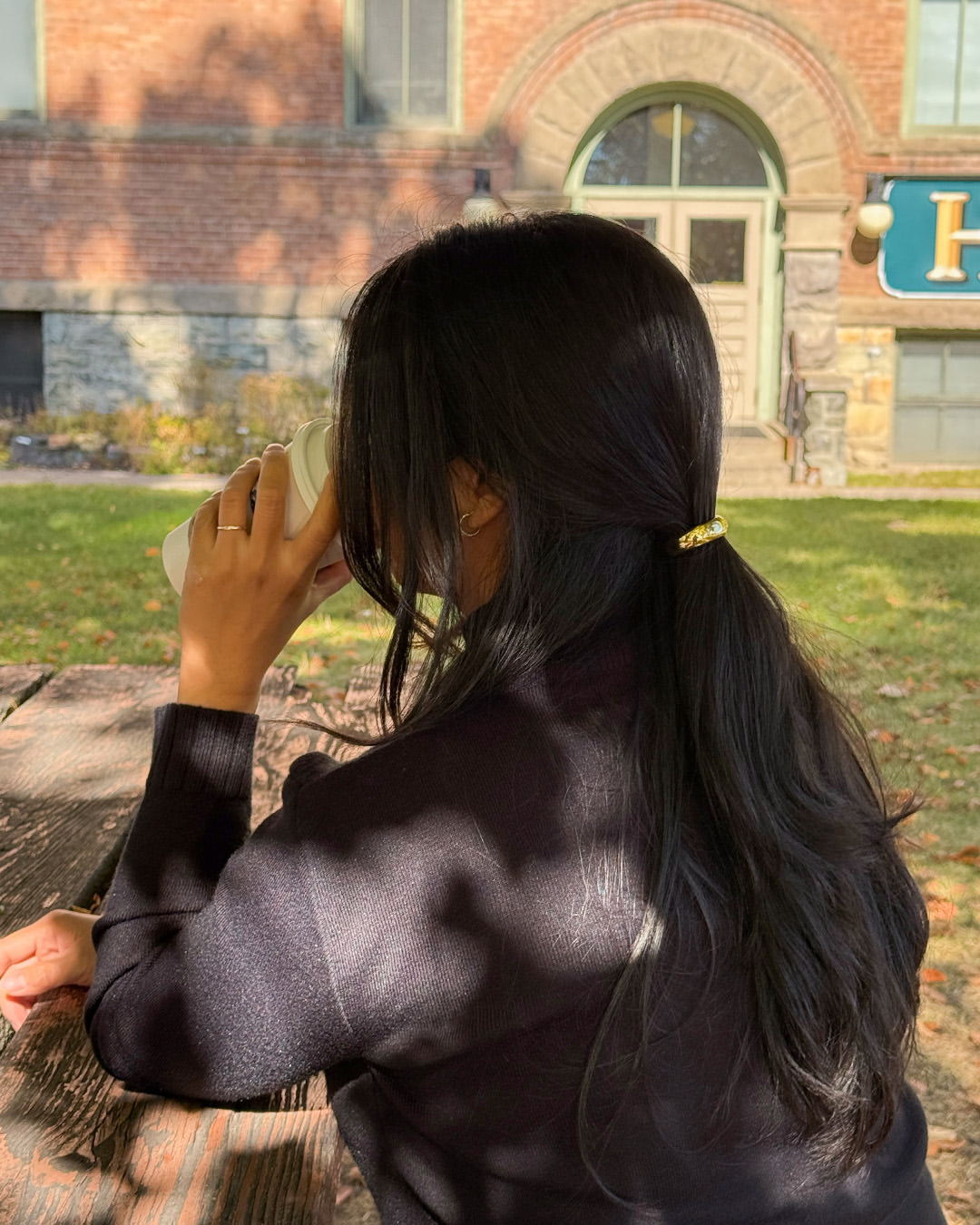 Effortless Waves Low Ponytail With Gold Hair Clip