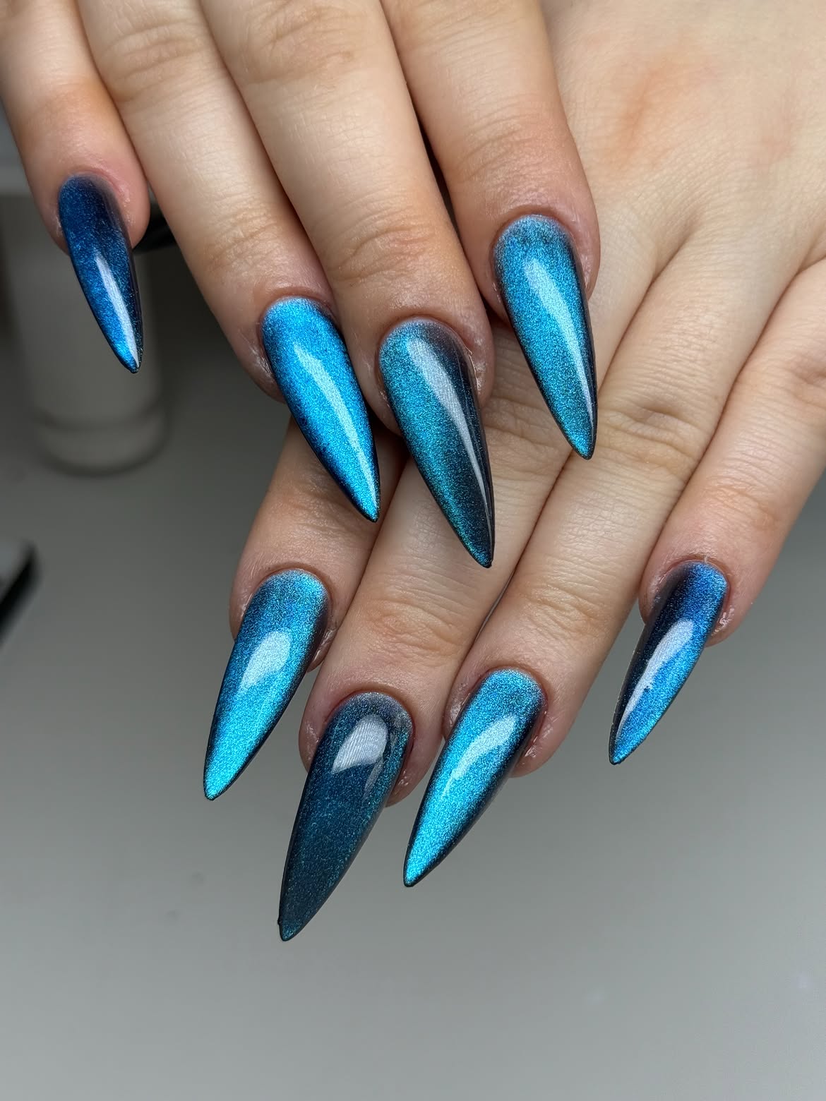 Electric Blue Cat Eye Stiletto Nails
