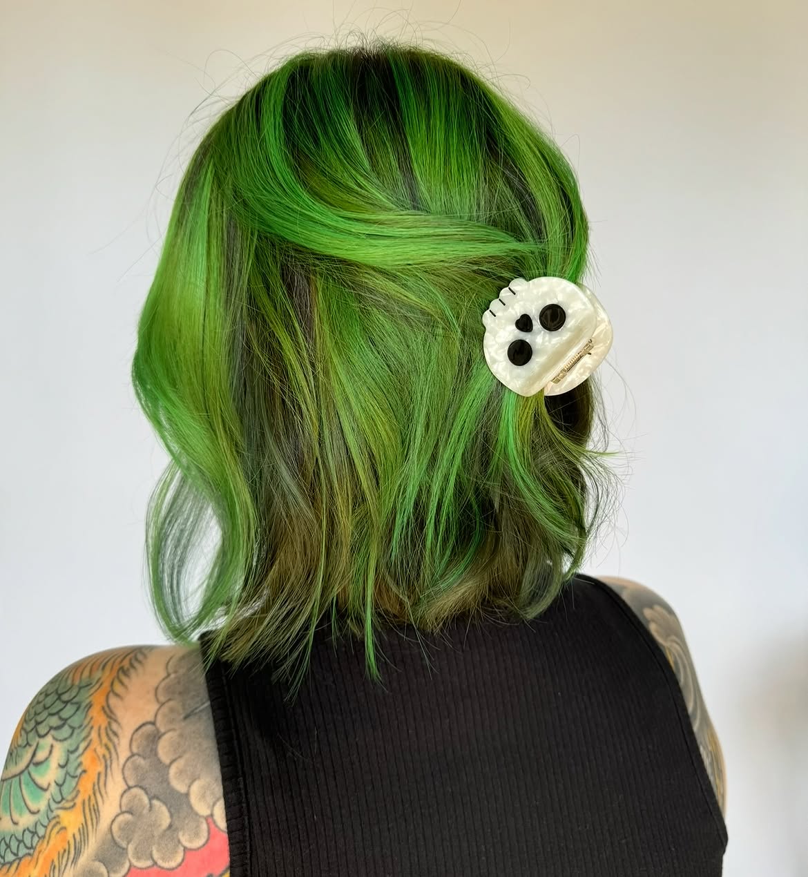 Electric Green Wavy Bob With Skull Clip