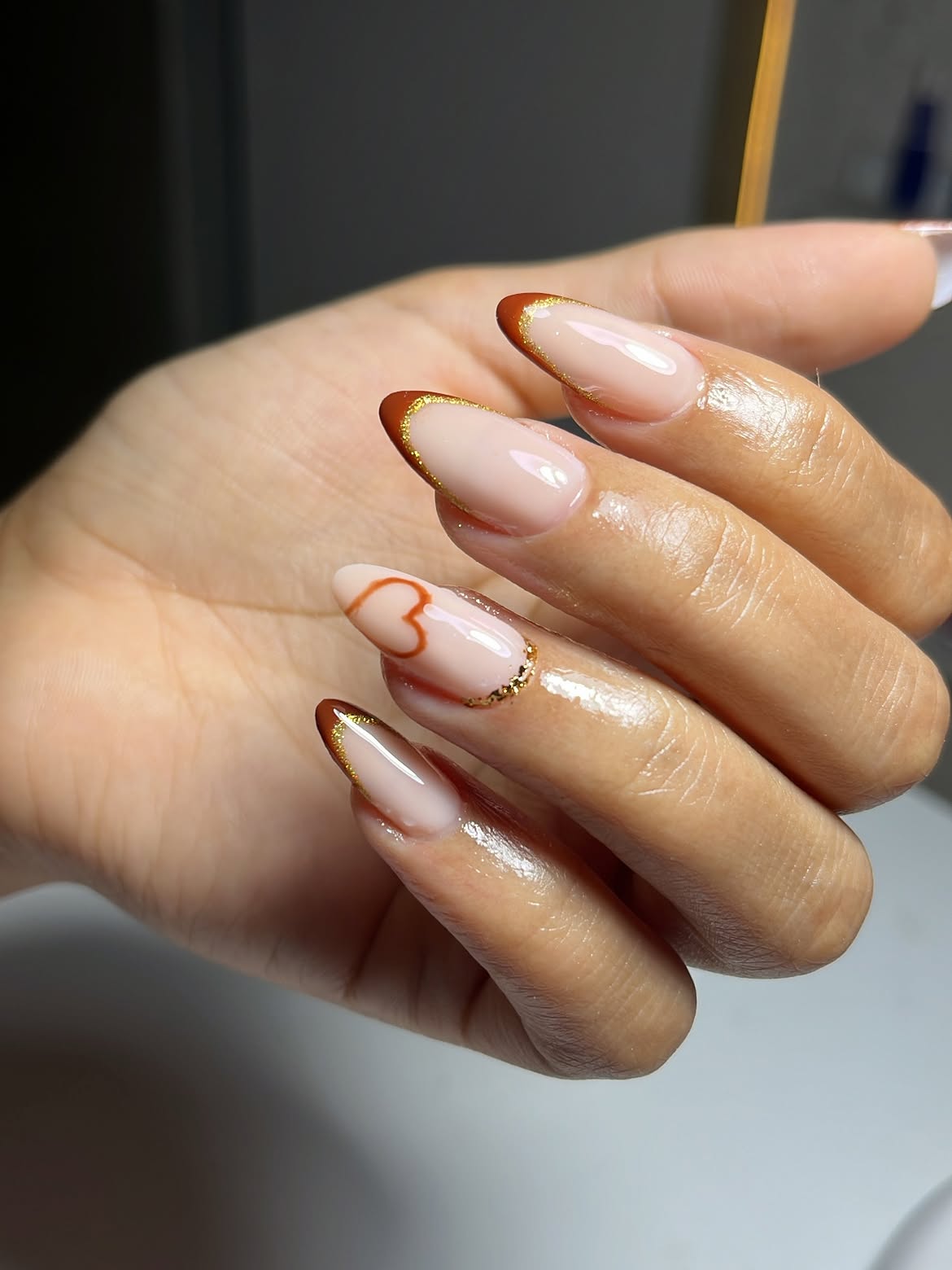 Elegant Almond French Tips With Heart Detail
