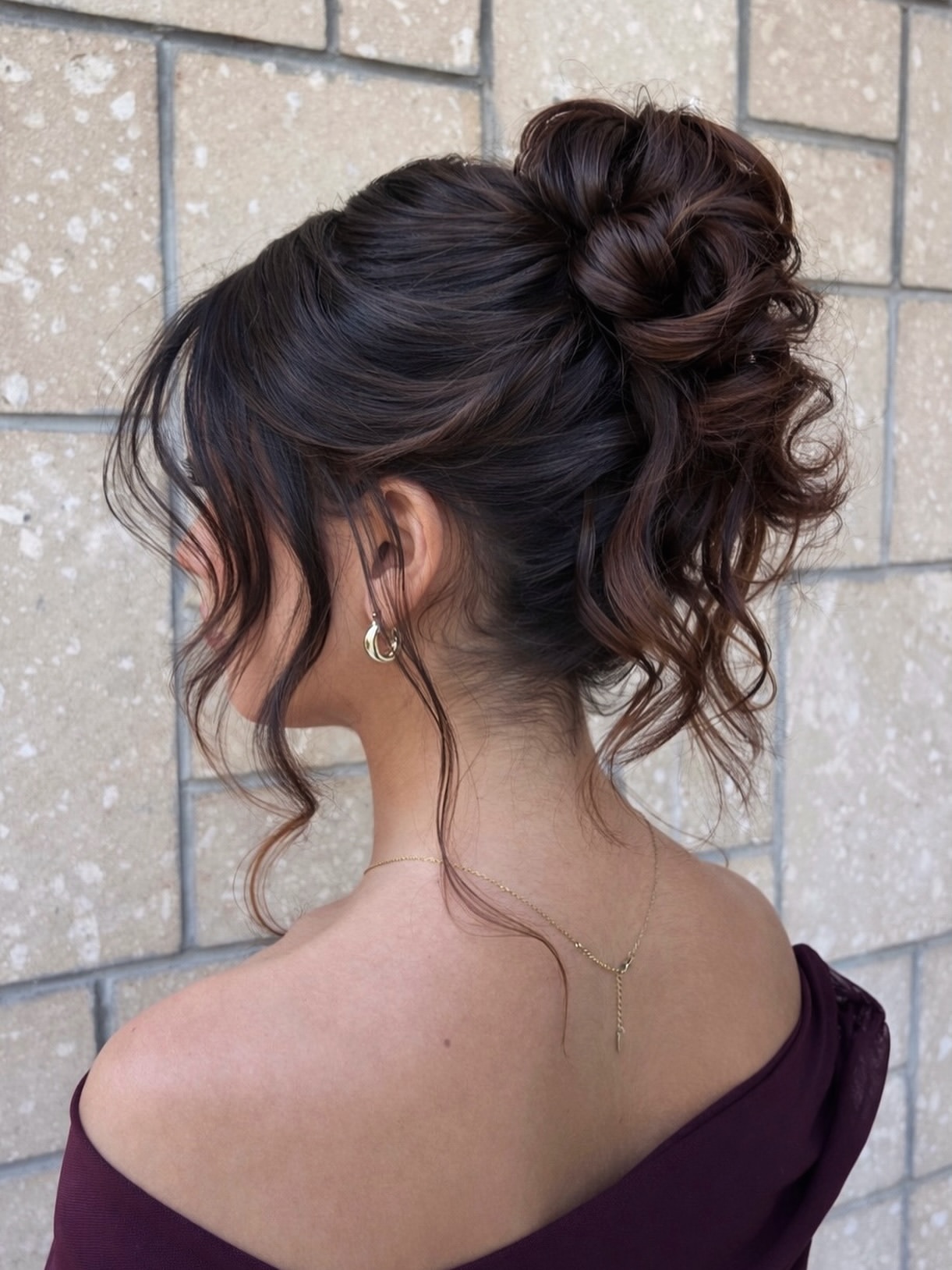 Elegant Messy Updo With Loose Face-Framing Curls