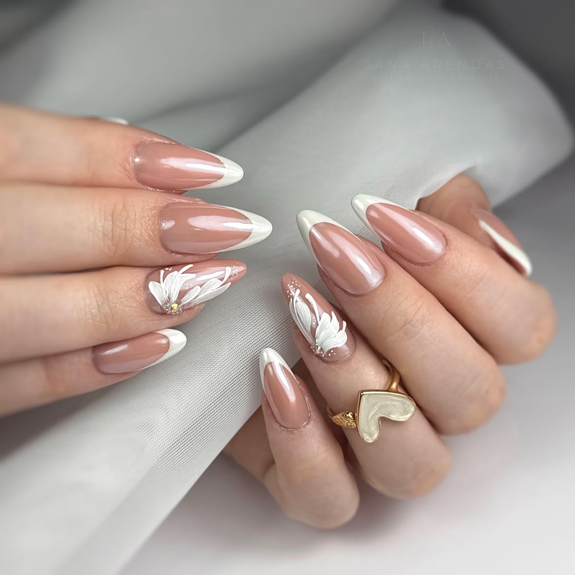 Elegant Milky French Almond Nails with Floral Art