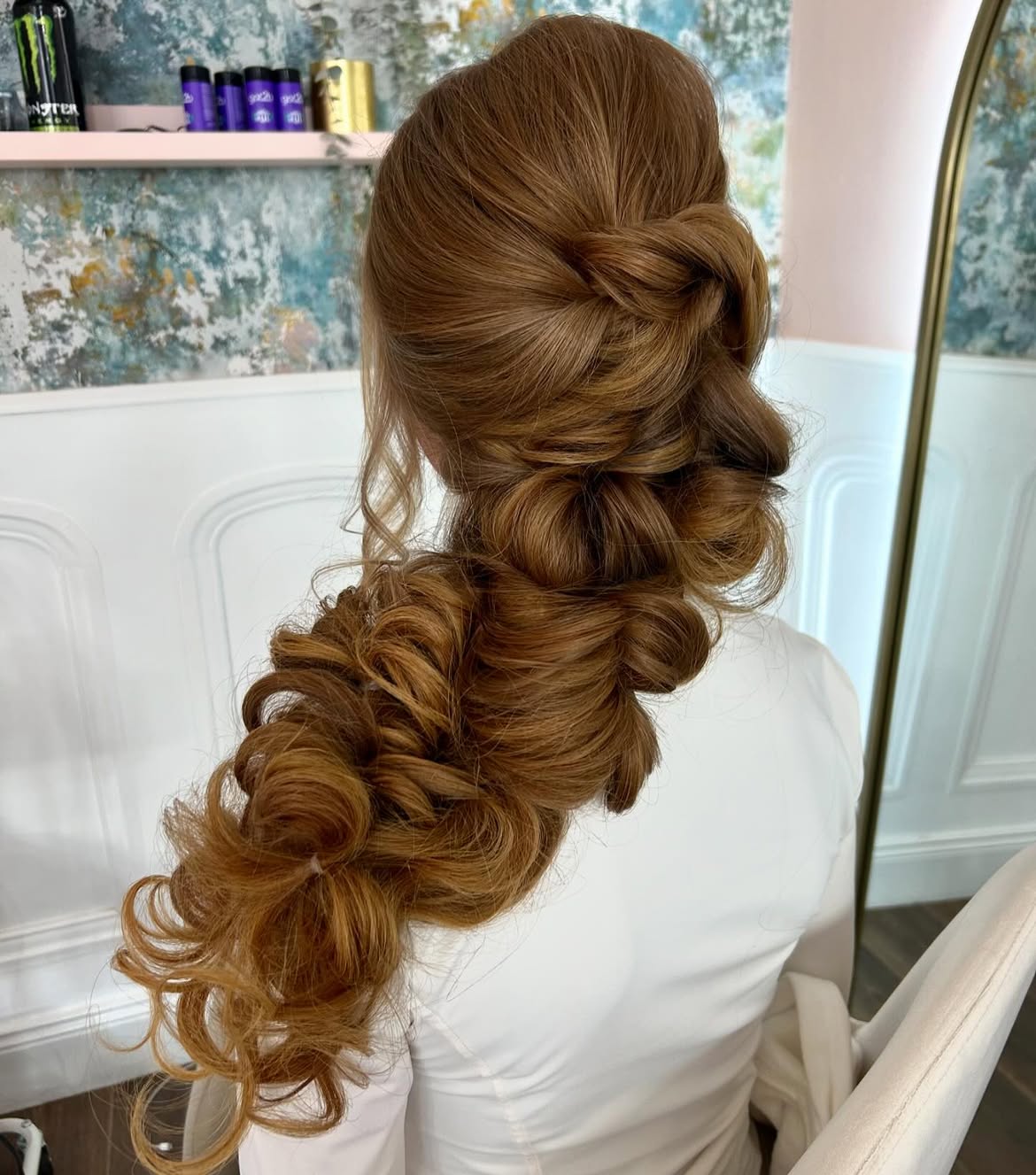 Elegant Twisted Low Side Braid With Loose Curls