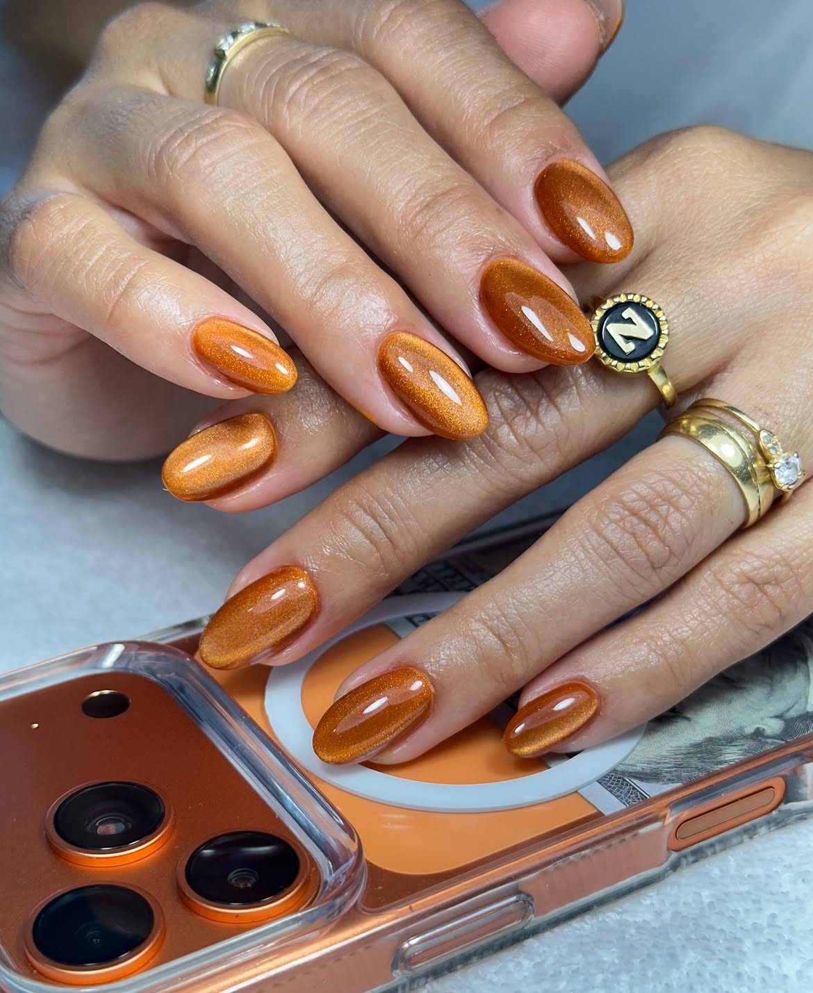 Fiery Orange Cat Eye Oval Nails