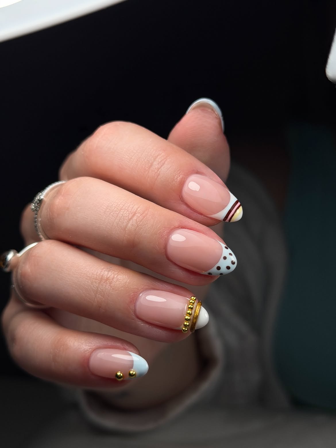 French Tips with Playful Polka Dots and Gold Accents