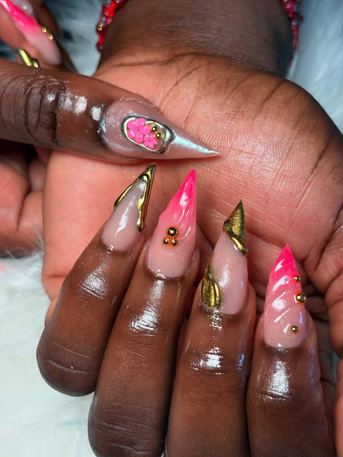 Gilded Pink Ombre Stiletto Nails with 3D Charms