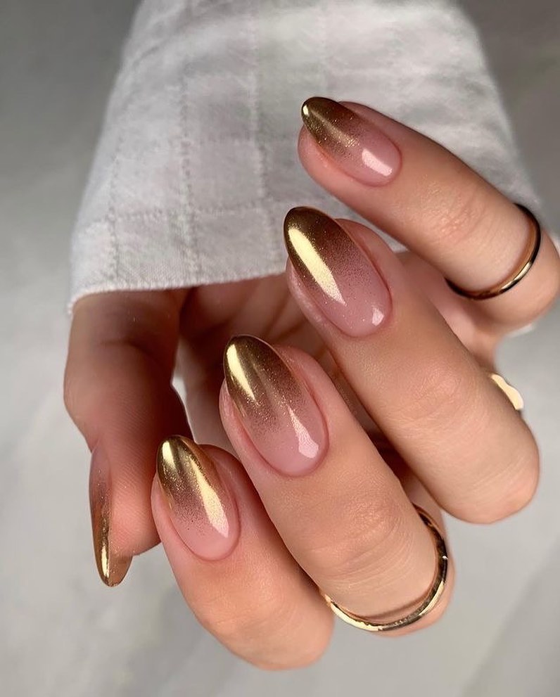 Glamorous Gold Chrome Ombré Almond Nails