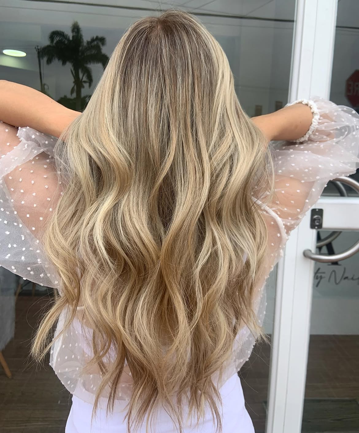 Gleaming Honey Blonde Waves With Subtle Shadow Root