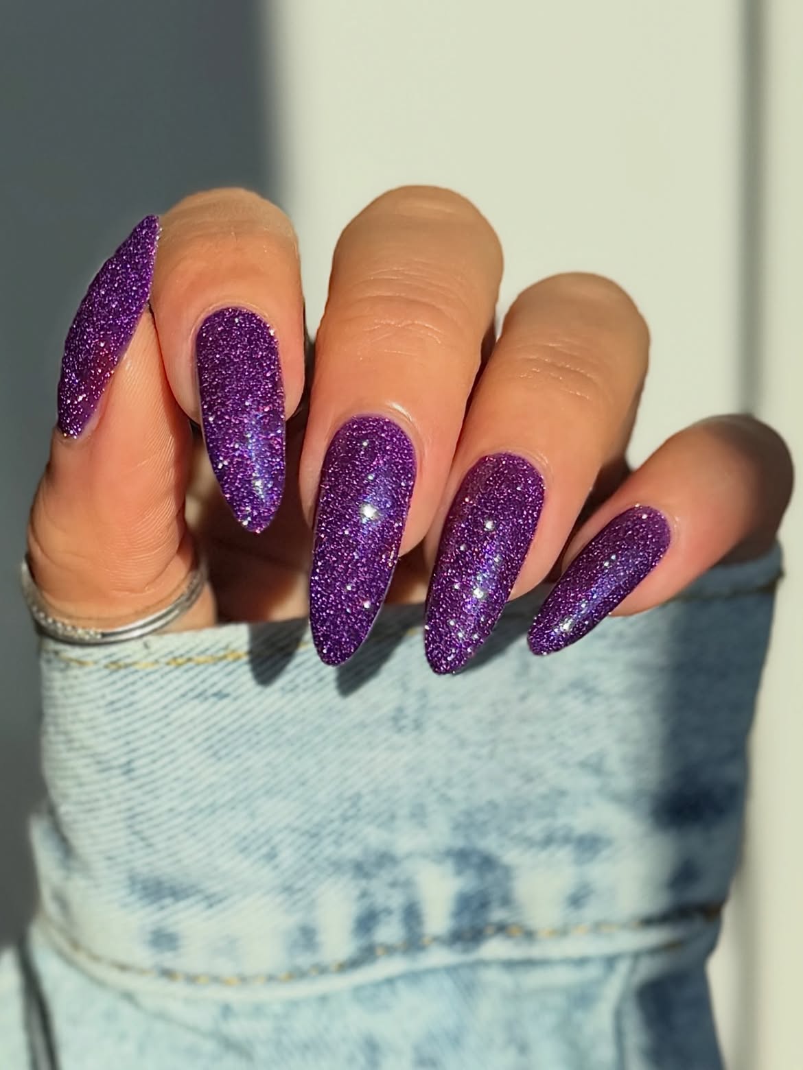 Glittering Amethyst Almond Shaped Nails