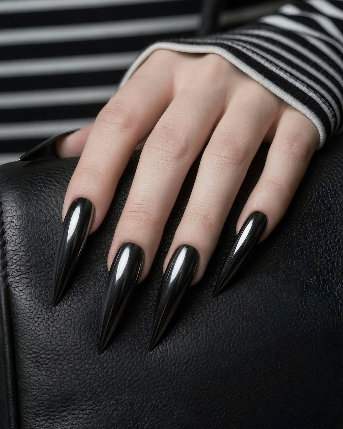 Glossy Black Stiletto Chrome Nails