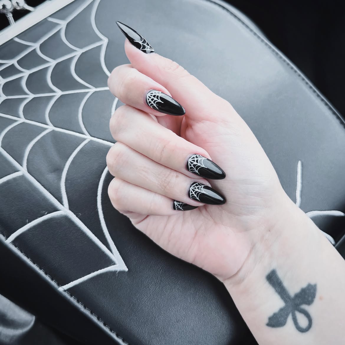 Glossy Black Stiletto Spiderweb Accent Nails