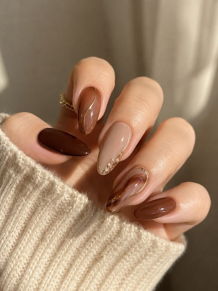 Glossy Chocolate Swirl Almond Nails