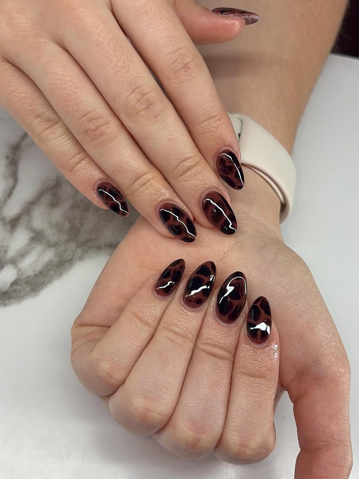 Glossy Dark Tortoiseshell Almond Nails