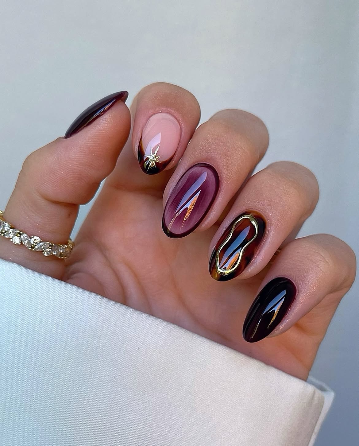 Glossy Deep Plum and Tortoiseshell French Nails