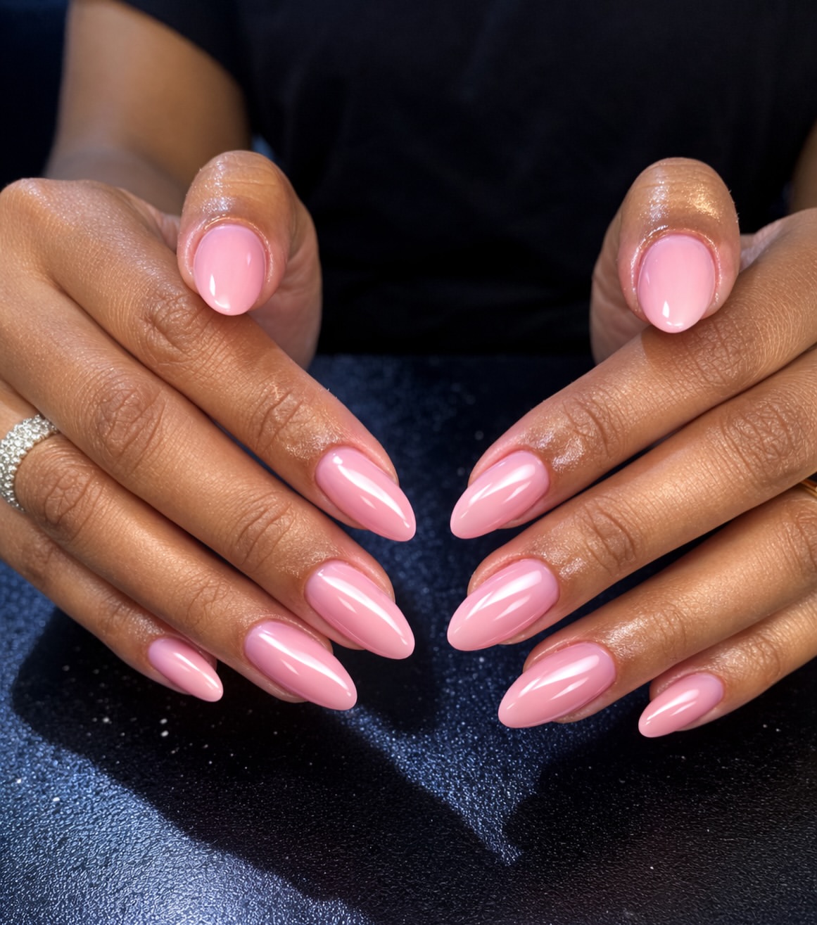 Glossy Pearl Pink Almond Shaped Nails