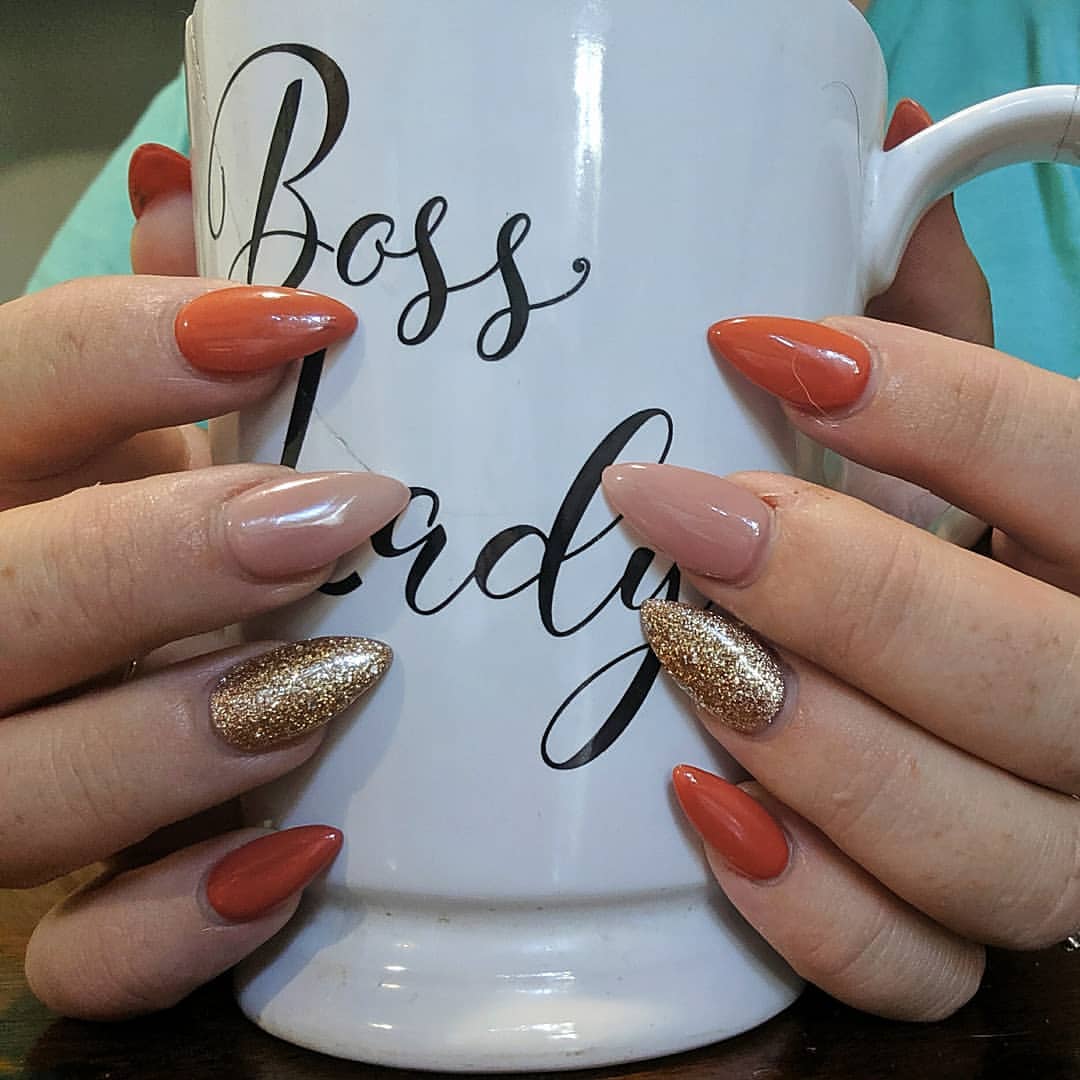 Glossy Terracotta and Gold Glitter Almond Nails