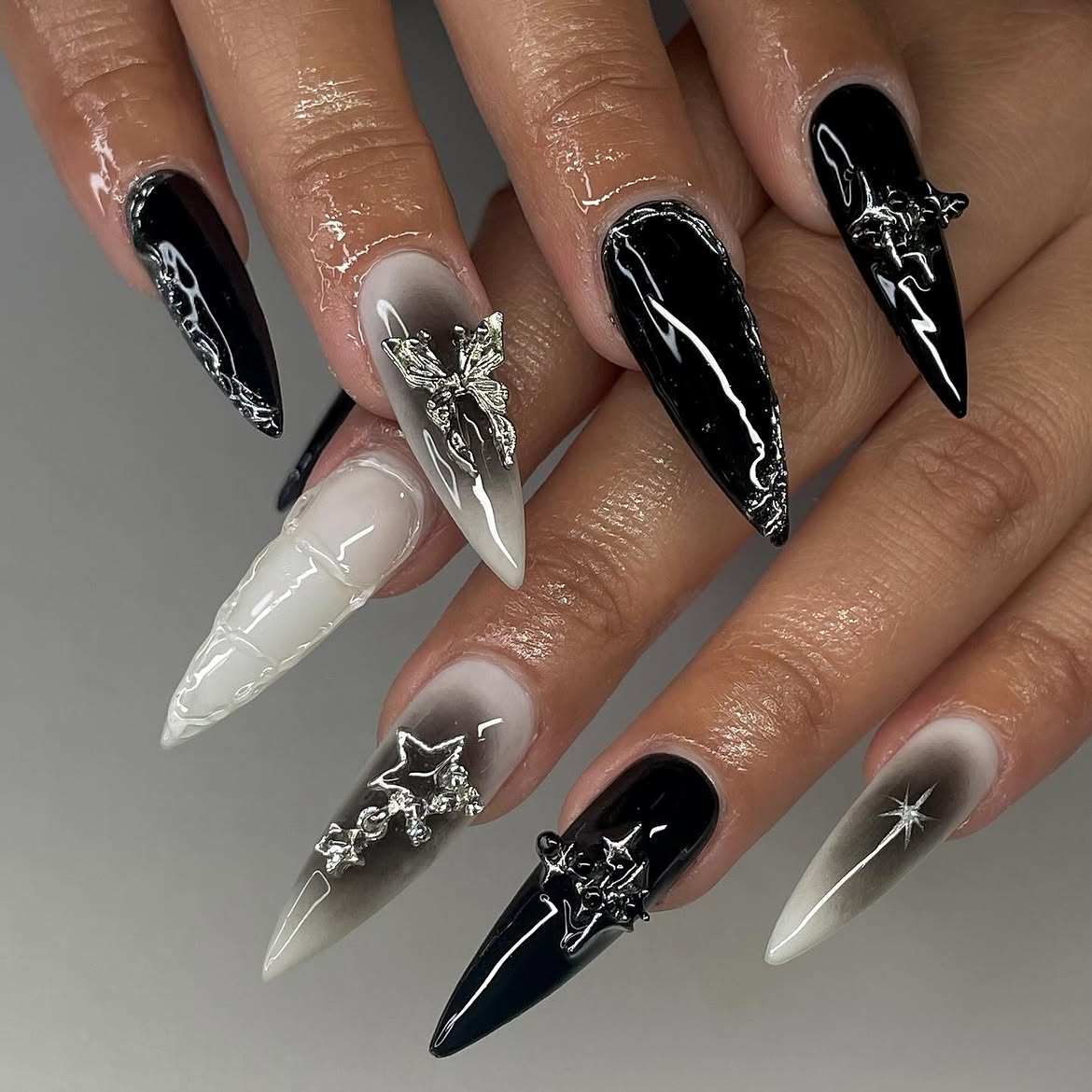 Gothic Glam Butterfly & Star Stiletto Nails