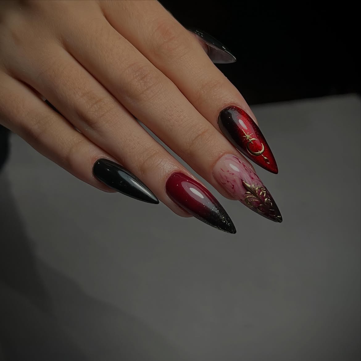Gothic Ombre Stiletto Nails with Celestial Accents