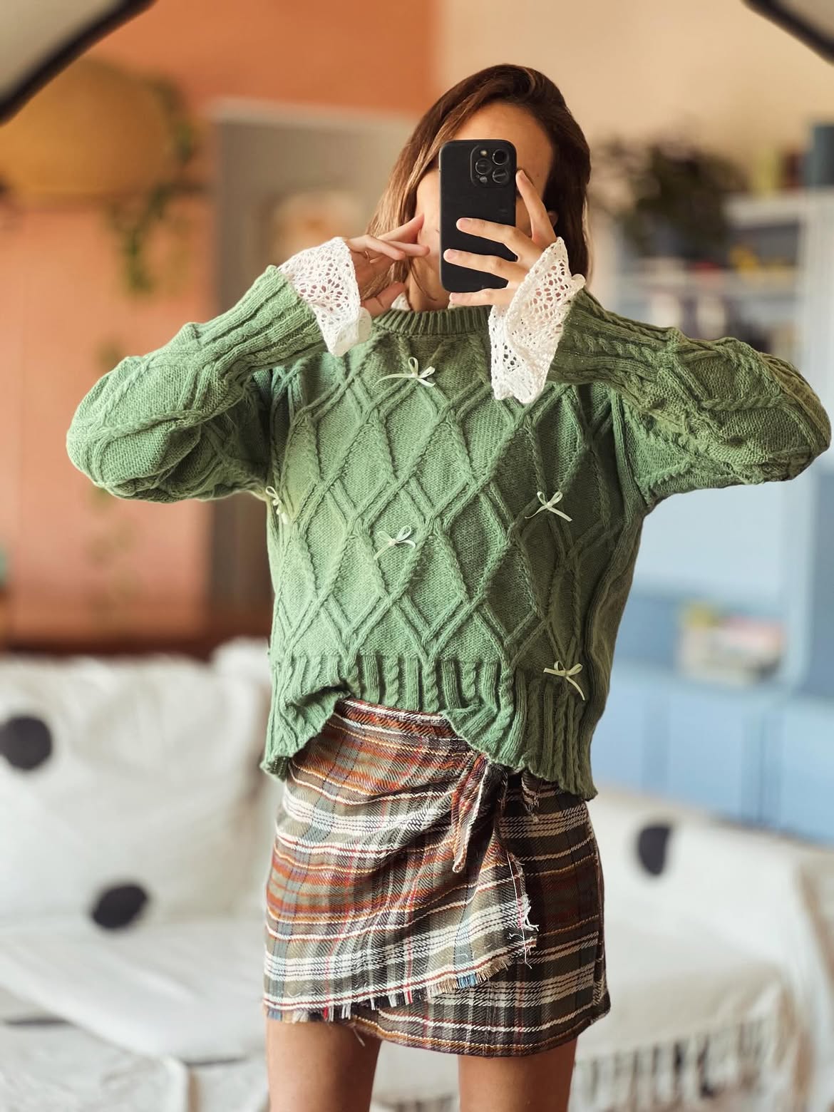 Green Cable Knit Sweater With Lace Cuffs And Plaid Mini Skirt